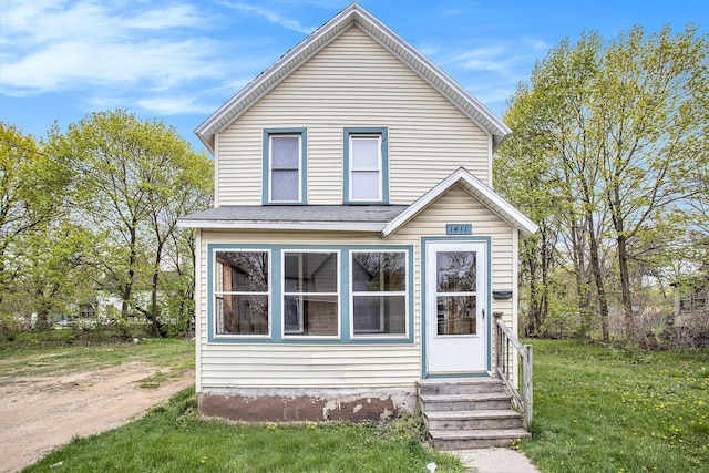 view of front property with a front lawn