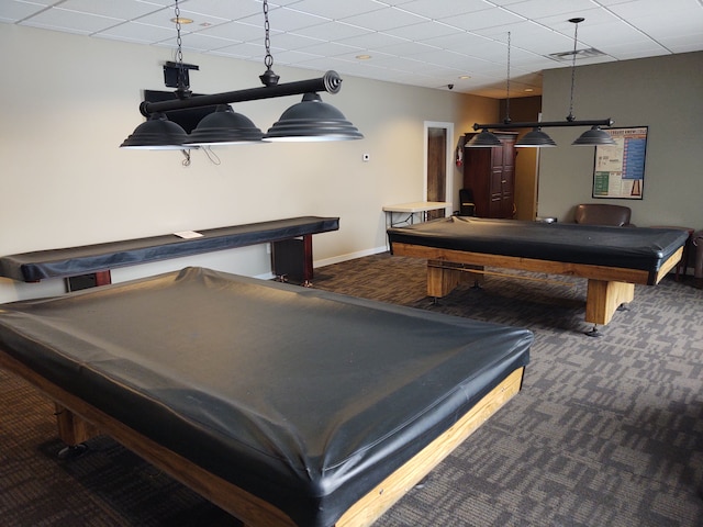 recreation room featuring a drop ceiling, pool table, and dark colored carpet