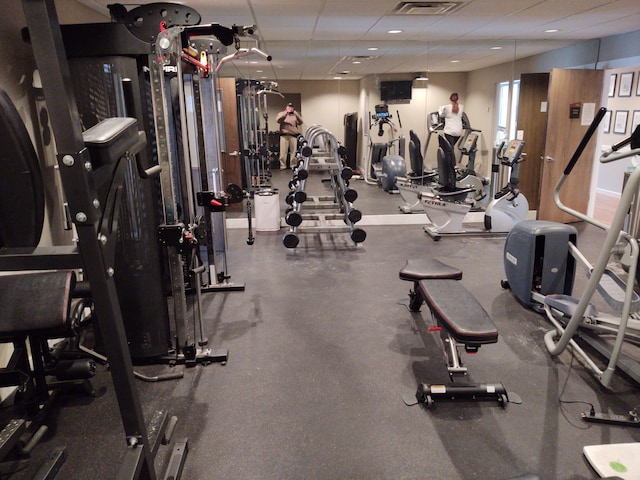 gym with a drop ceiling