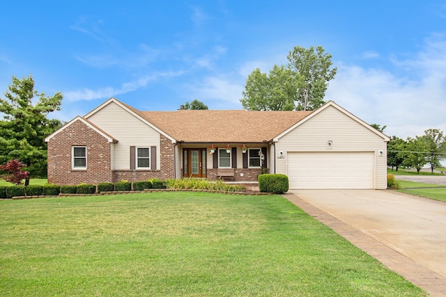 ranch-style house with an attached garage, a front lawn, concrete driveway, and brick siding