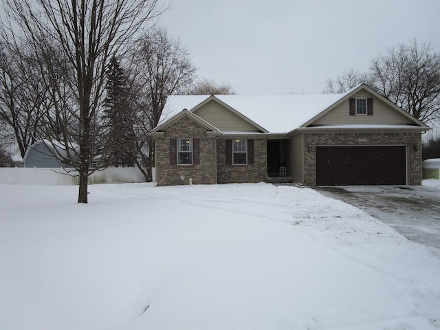 single story home with a garage