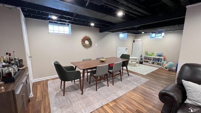 dining space featuring hardwood / wood-style flooring