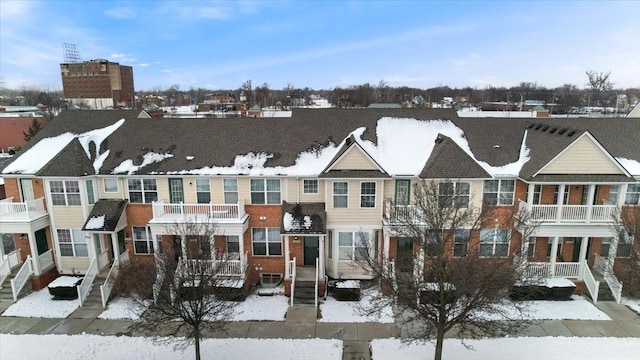 view of front of house featuring brick siding