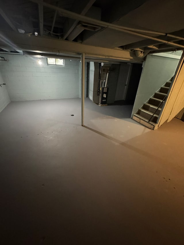 basement featuring heating unit