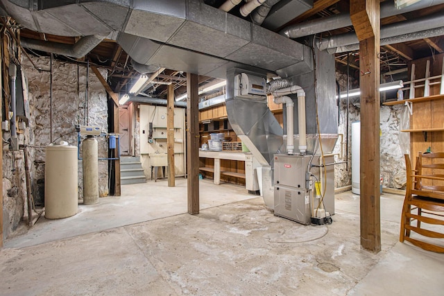 basement featuring heating unit