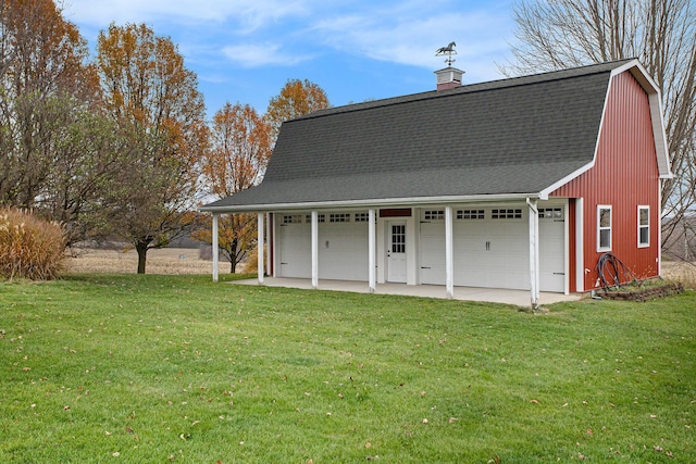 garage with a yard