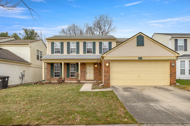 view of front property featuring a garage, a front lawn, and a porch