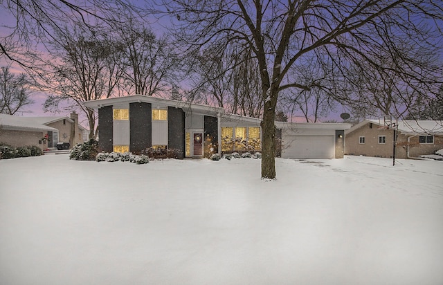 view of front of property featuring a garage