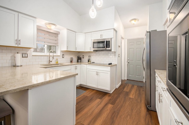 kitchen featuring white cabinets, sink, and stainless steel appliances