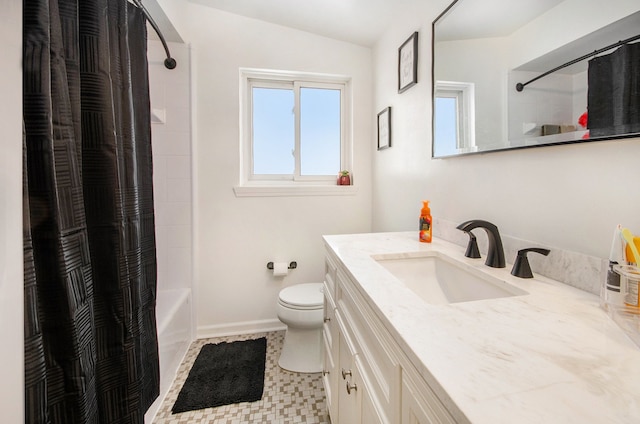 full bathroom featuring toilet, vanity, and shower / bath combination with curtain