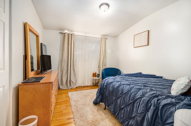 bedroom with light hardwood / wood-style flooring