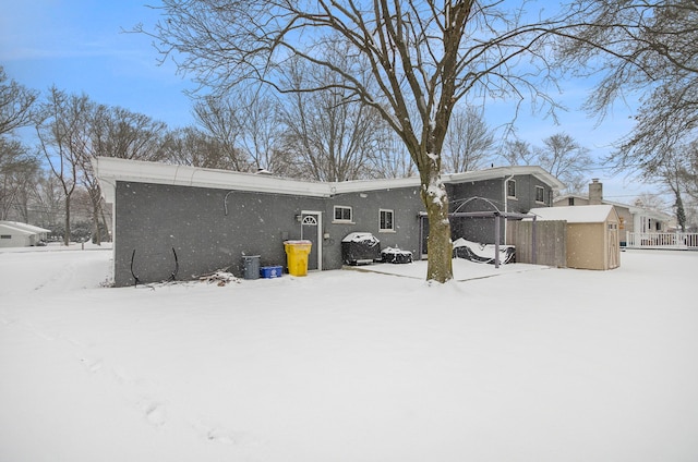 view of snow covered property