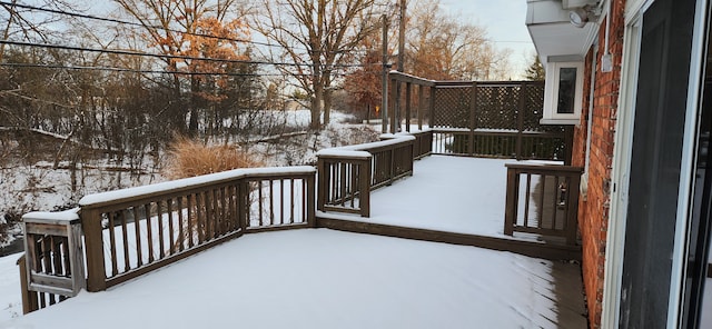 view of snow covered deck