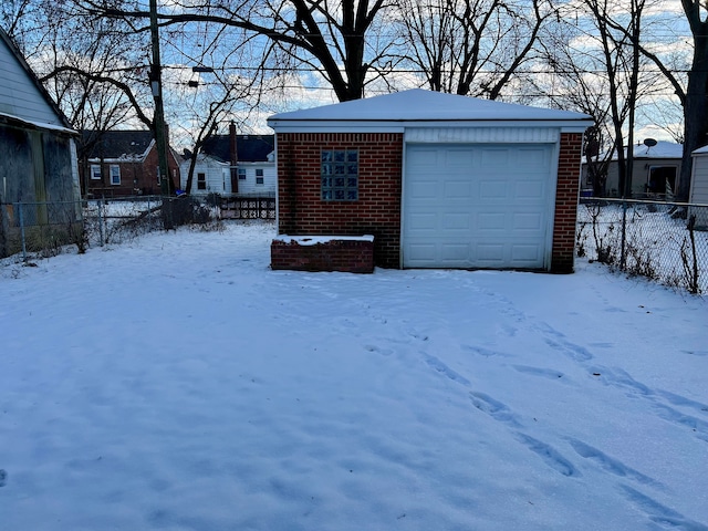 view of snow covered garage