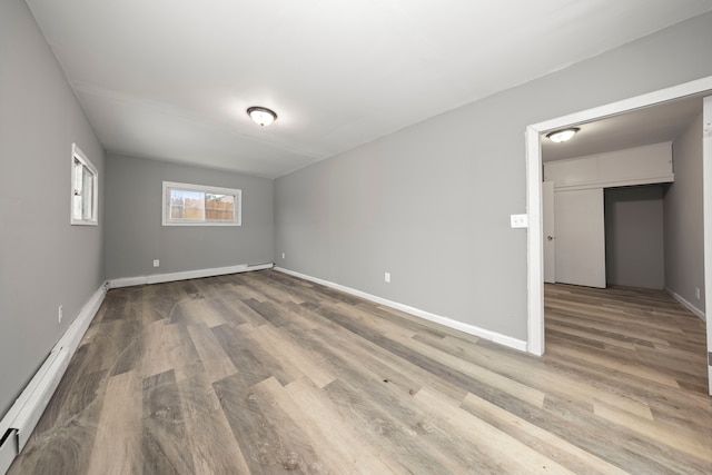 unfurnished room featuring hardwood / wood-style floors