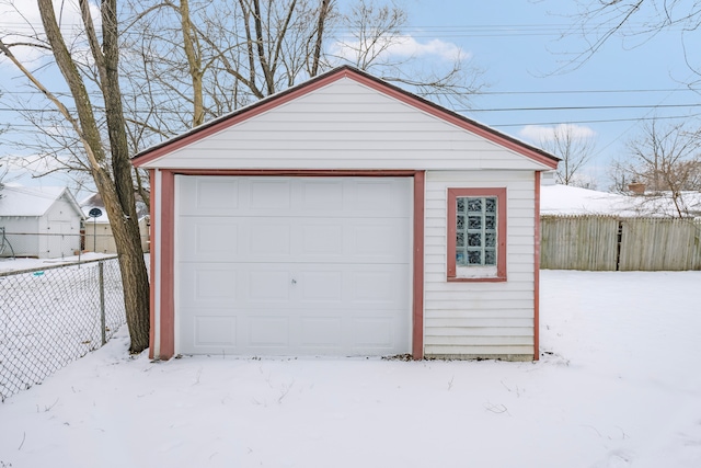 view of snow covered garage