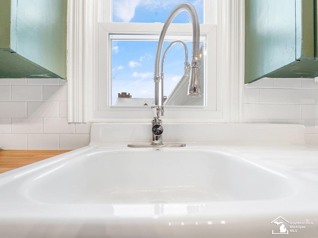 room details with sink and decorative backsplash