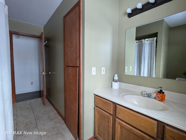 bathroom featuring tile patterned floors and vanity