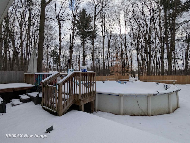 view of snow covered deck