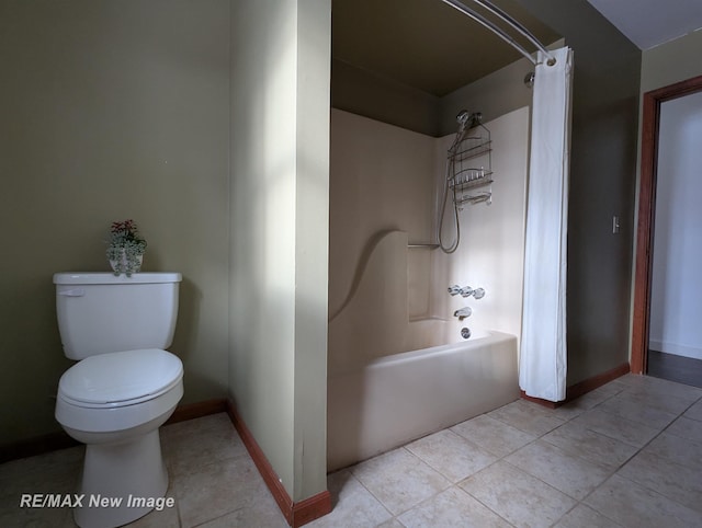 bathroom with toilet, tile patterned floors, and shower / bath combo with shower curtain