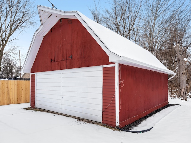 view of snow covered garage