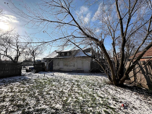 view of yard covered in snow