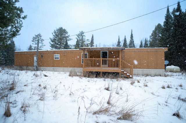 view of snow covered property