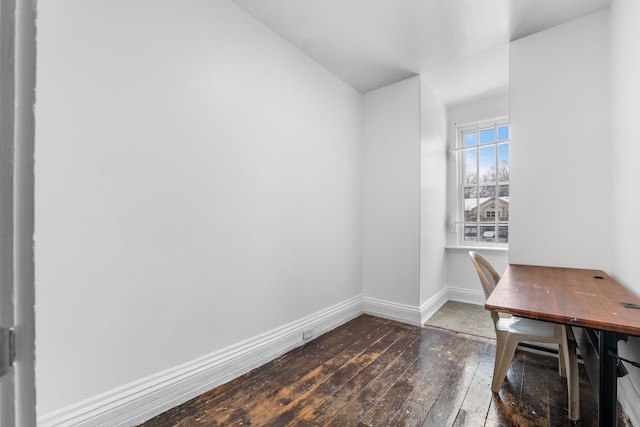 unfurnished office featuring dark hardwood / wood-style flooring