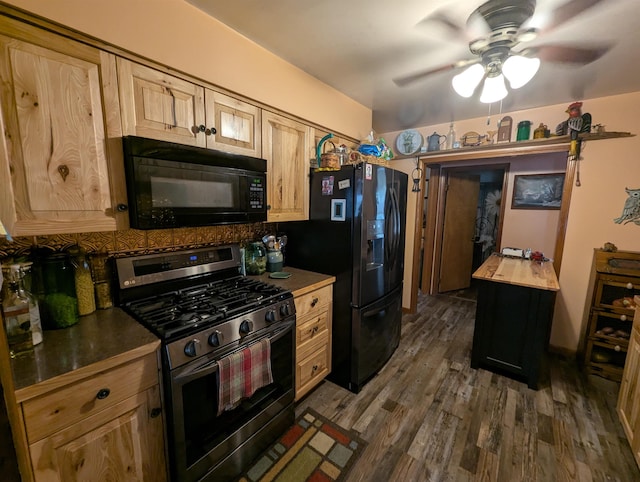 kitchen with backsplash, black appliances, dark hardwood / wood-style flooring, and wooden counters