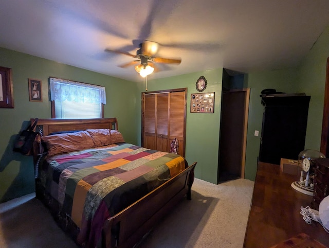 bedroom with ceiling fan and a closet