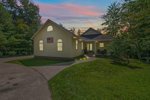 view of front of home with a yard