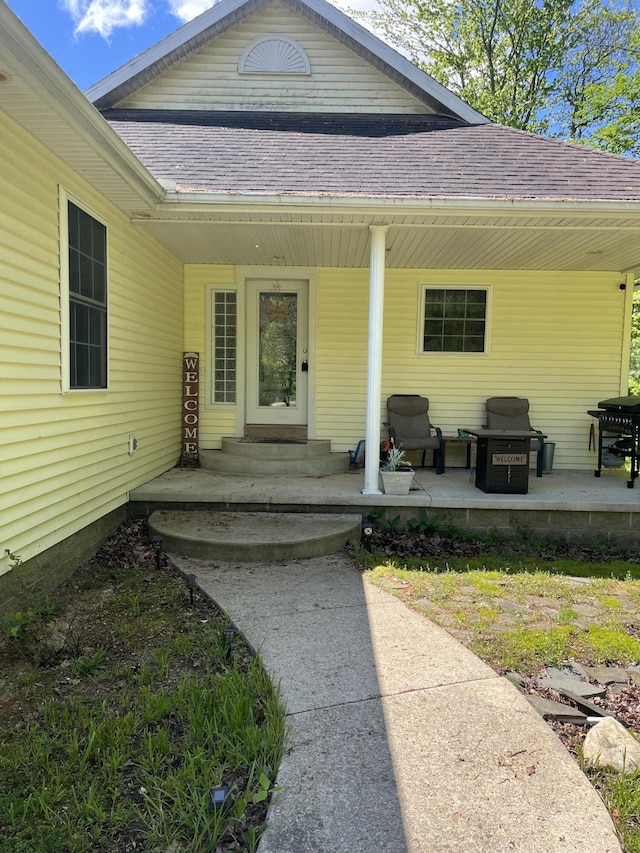 2273 Woodland Trl, Hillsdale, MI 49242 - property entrance with roof with shingles