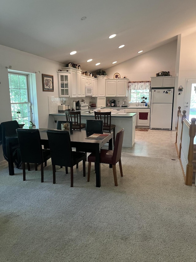 2273 Woodland Trl, Hillsdale, MI 49242 - dining area with plenty of natural light, recessed lighting, and light carpet