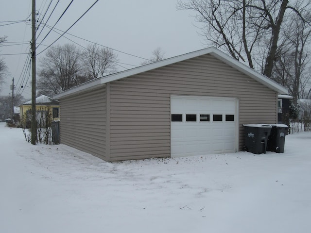 view of snow covered garage