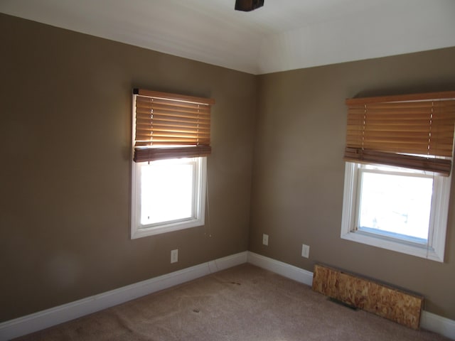 view of carpeted spare room