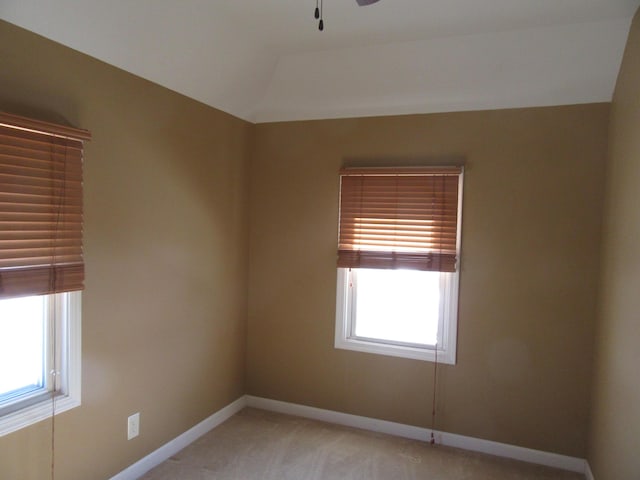 empty room with light colored carpet