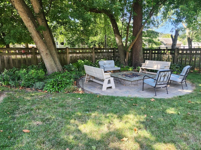 view of yard with a patio area and a fire pit