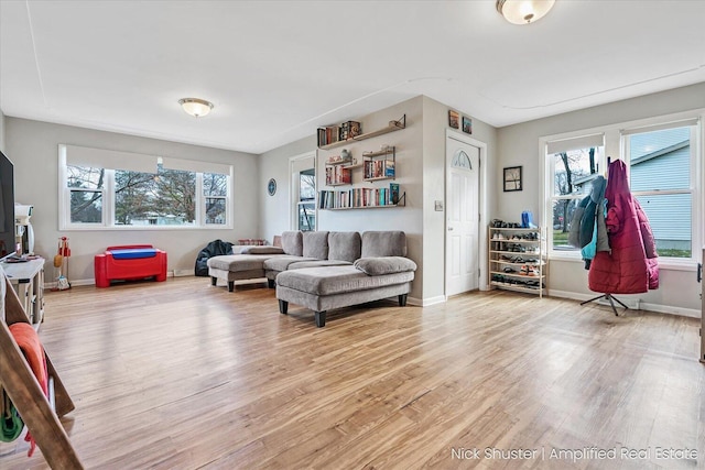 living room with light hardwood / wood-style floors