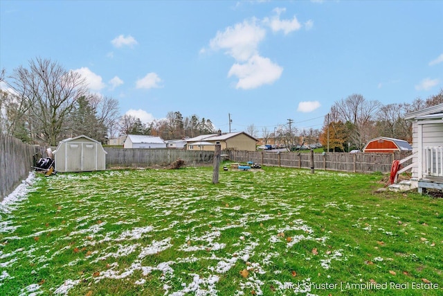 view of yard with a storage shed