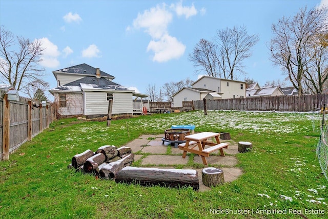 view of yard featuring a patio area and a fire pit