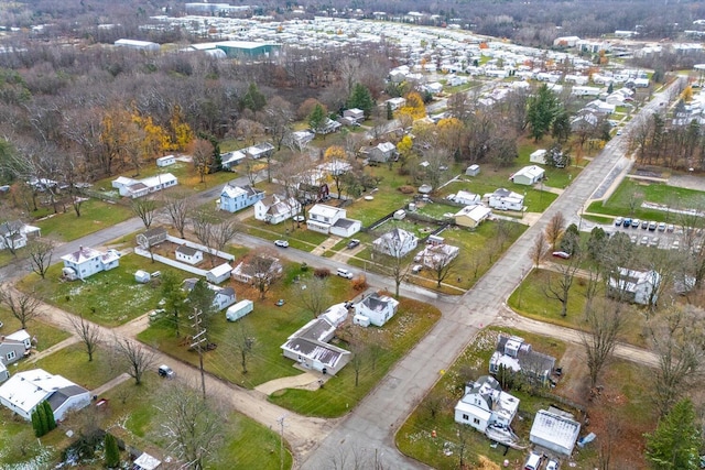 aerial view of property's location with nearby suburban area
