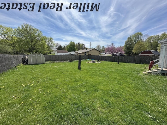 604 E Hubble St, Hastings, MI 49058 - view of yard featuring a shed and an outbuilding