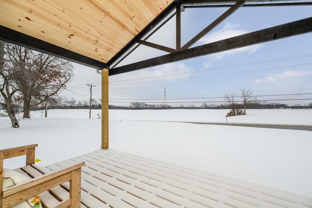 view of snow covered deck