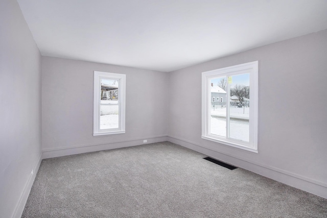 view of carpeted spare room