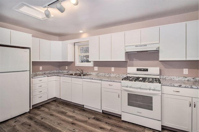 kitchen with dark wood-type flooring, sink, white cabinets, and white appliances