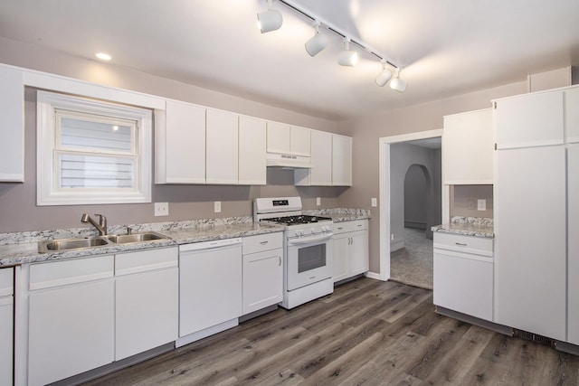 kitchen featuring sink, white appliances, white cabinets, and dark hardwood / wood-style flooring