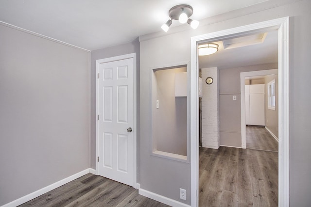 corridor with dark wood-type flooring