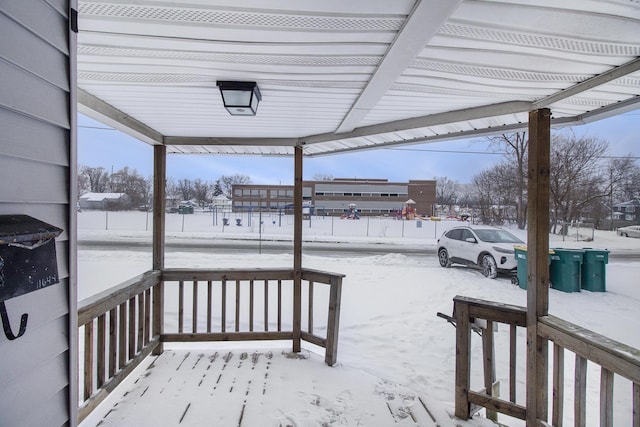 view of snow covered deck