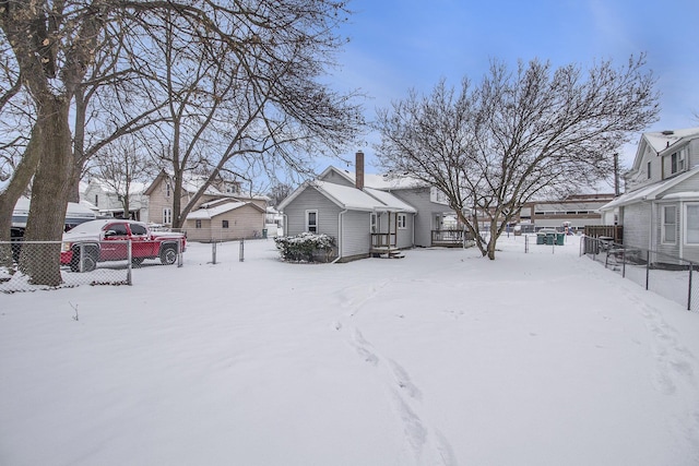 view of yard covered in snow