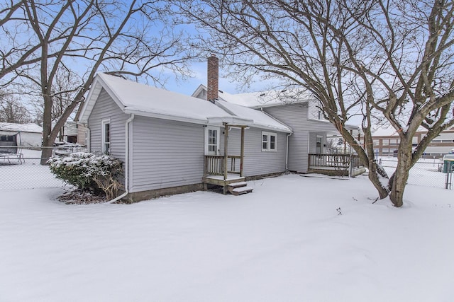 view of snow covered property